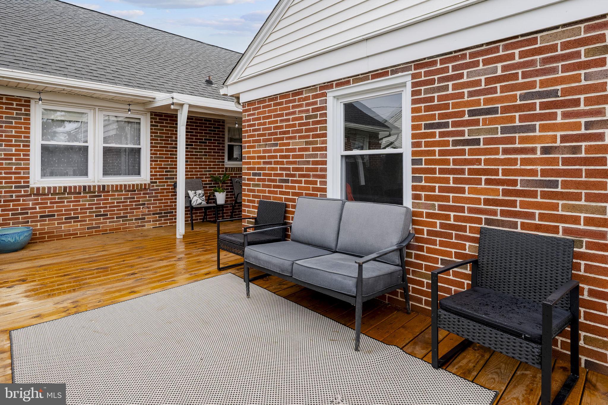 210 Musser Road East Earl, PA 17519 - Photo 10 of 44 a view of a patio with couches chairs and potted plants