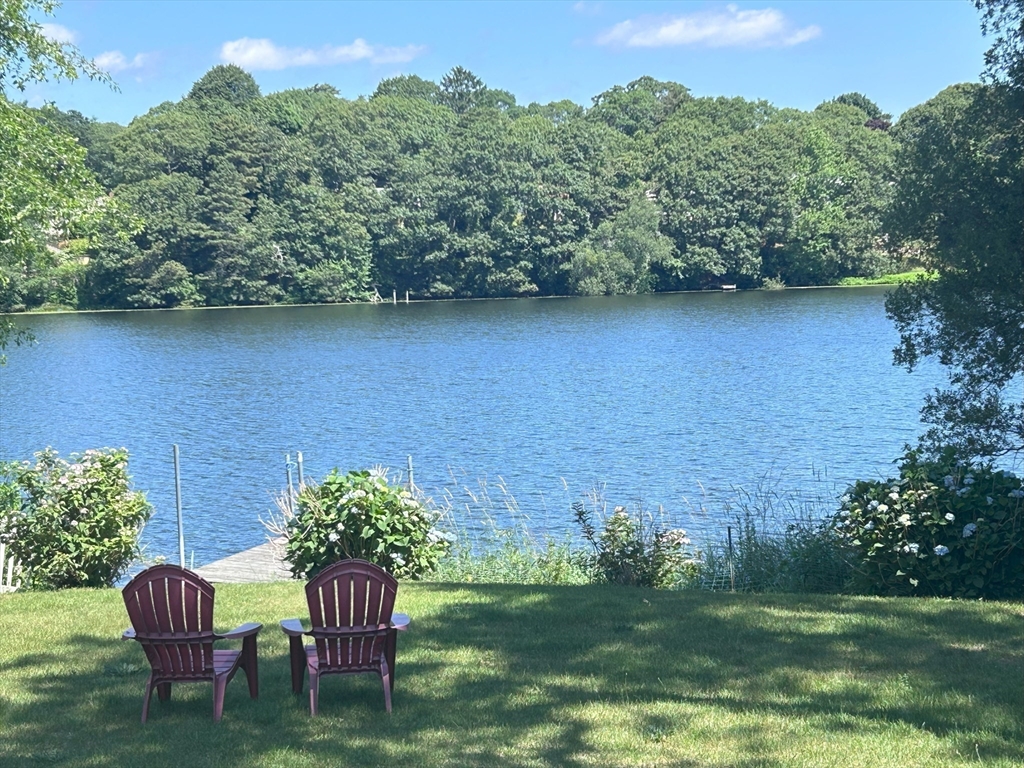 17 Maple Street Bourne, MA 02532 - Photo 1 of 33 a view of a chairs in backyard of house