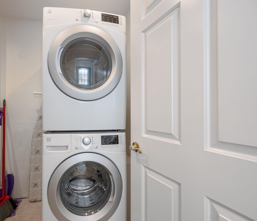 17 Maple Street Bourne, MA 02532 - Photo 29 of 33 a utility room with dryer and washer
