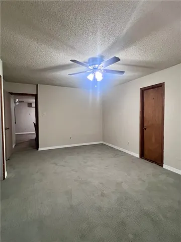 a bathroom with a sink vanity and mirror