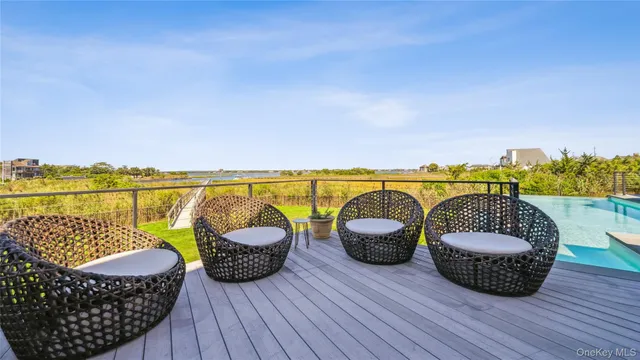 swimming pool with an outdoor seating