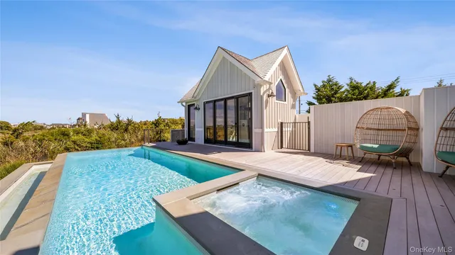 a view of swimming pool with a yard