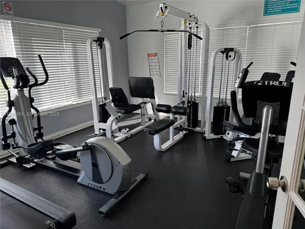 a view of a room with gym equipment