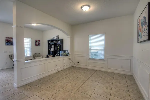 a large white room with window