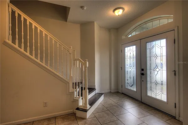 a view of entryway with stairs