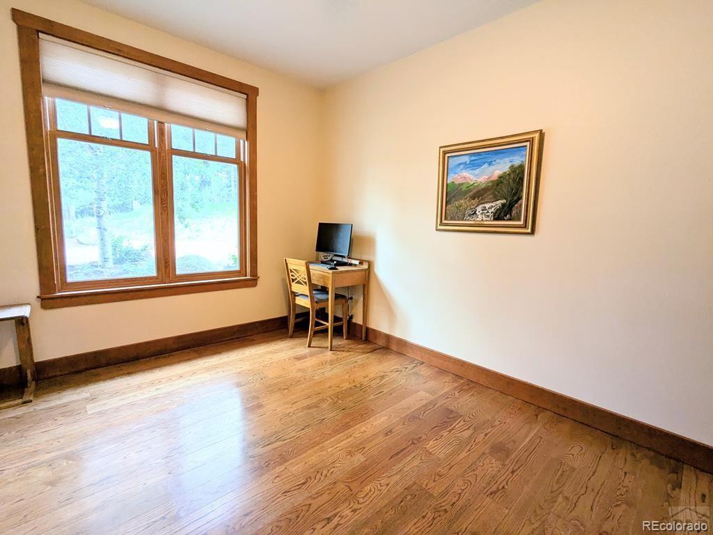 10 Robert Road Rye, CO 81069 - Photo 15 of 50 a view of a workspace with furniture and a window