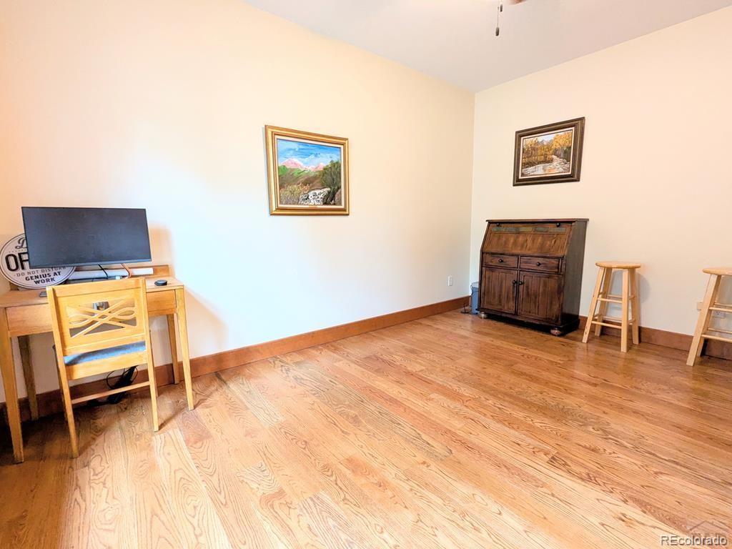 10 Robert Road Rye, CO 81069 - Photo 16 of 50 a view of a livingroom with furniture and a flat screen tv