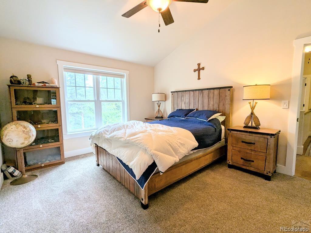 10 Robert Road Rye, CO 81069 - Photo 22 of 50 a bed room with furniture and a window