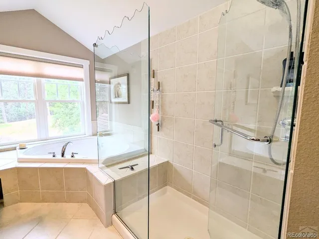 a view of a large mountain with a mountain in the background