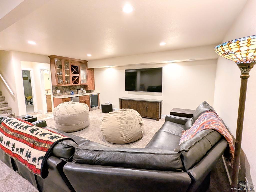 10 Robert Road Rye, CO 81069 - Photo 34 of 50 a living room with furniture and a flat screen tv