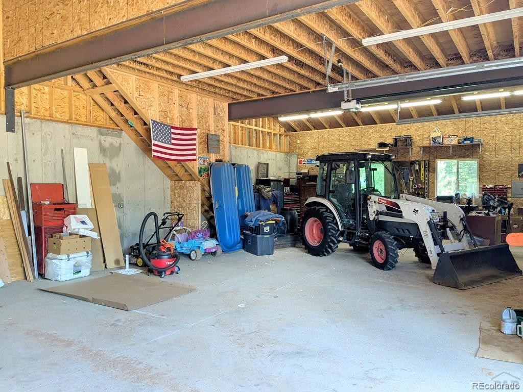 10 Robert Road Rye, CO 81069 - Photo 46 of 50 a view of a garage with a car and a garage