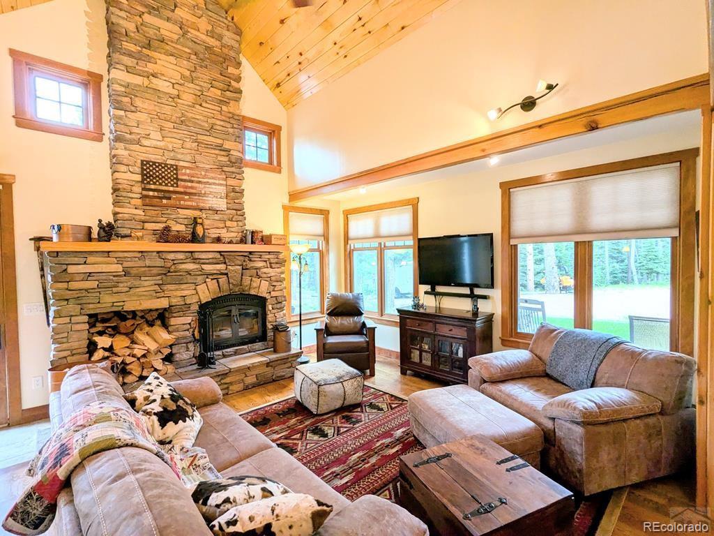 10 Robert Road Rye, CO 81069 - Photo 8 of 50 a living room with furniture fireplace and flat screen tv