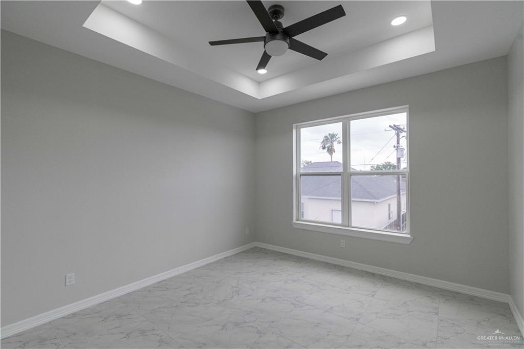 5404 North Crown Point Pharr, TX 78577 - Photo 13 of 24 an empty room with a window