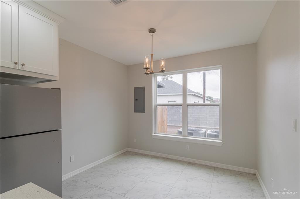 5404 North Crown Point Pharr, TX 78577 - Photo 6 of 24 a view of an empty room with a window