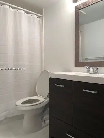 a bathroom with a sink and a toilet