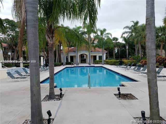 650 South Park Road, Unit 285 Hollywood, FL 33021 - Photo 13 of 13 a view of a house with swimming pool and sitting area