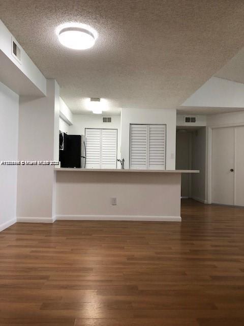 650 South Park Road, Unit 285 Hollywood, FL 33021 - Photo 4 of 13 a view of empty room with wooden floor