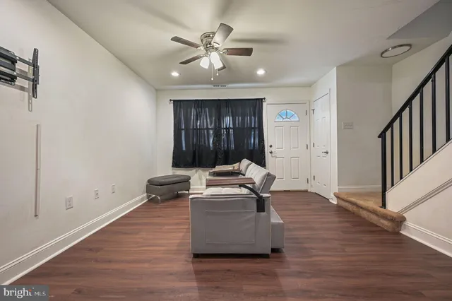a view of a livingroom with wooden floor