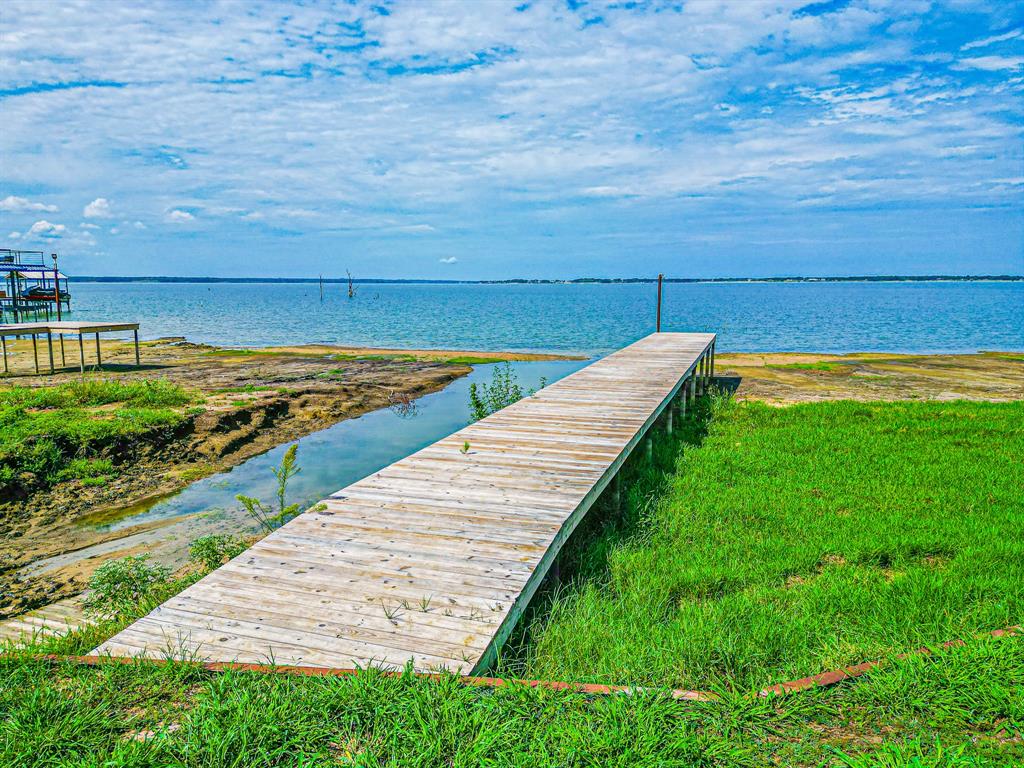 Lot 199 Peninsula Road Kerens, TX 75144 - Photo 17 of 26 a view of a swimming pool with an ocean view