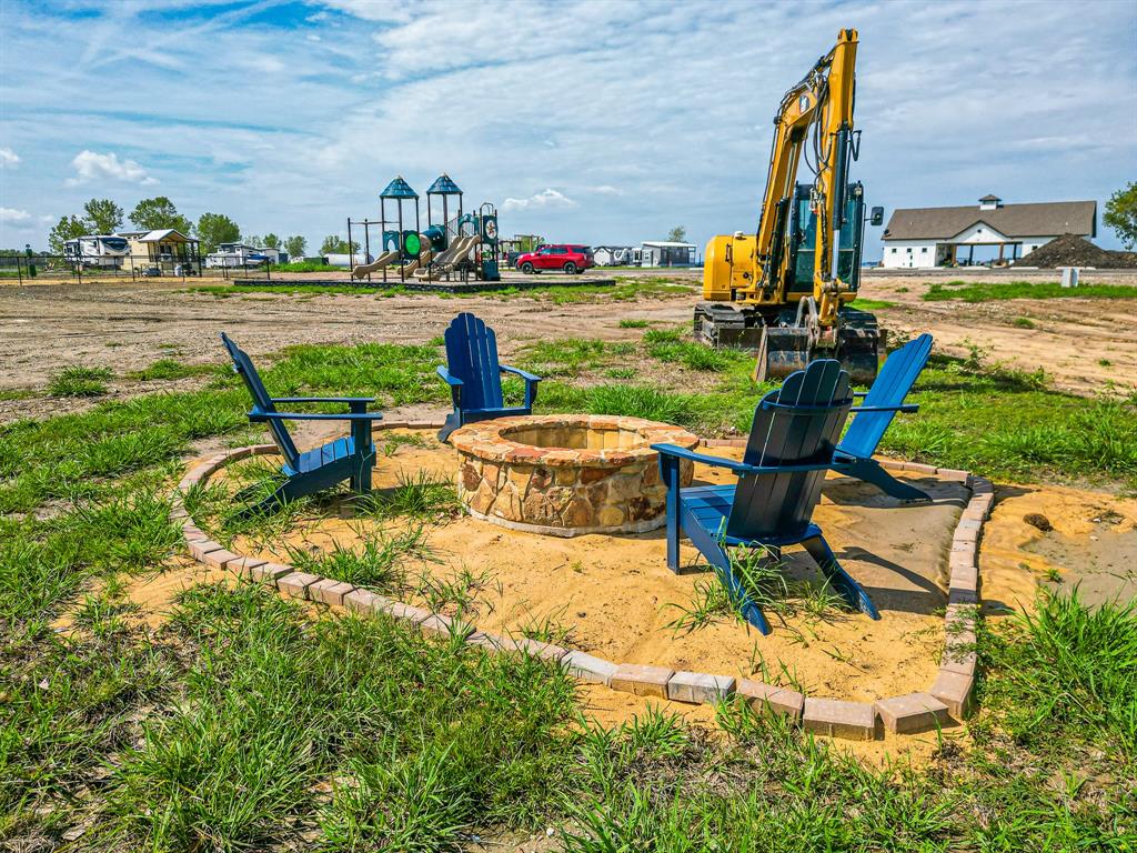 Lot 199 Peninsula Road Kerens, TX 75144 - Photo 18 of 26 a view of a ocean with a lounge chairs