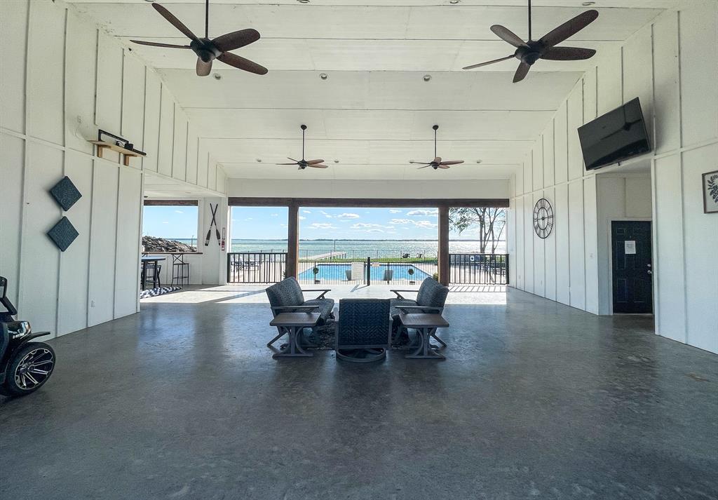 Lot 199 Peninsula Road Kerens, TX 75144 - Photo 22 of 26 a view of a livingroom with furniture window and a ceiling fan