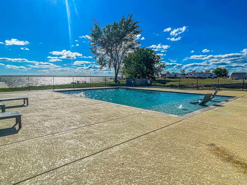Lot 199 Peninsula Road Kerens, TX 75144 - Photo 24 of 26 a view of swimming pool with outdoor seating