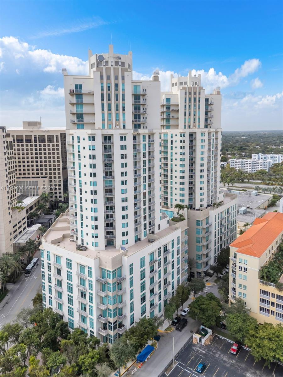 9066 Southwest 73rd Court, Unit 908 Miami, FL 33156 - Photo 2 of 46 a view of a city with tall buildings