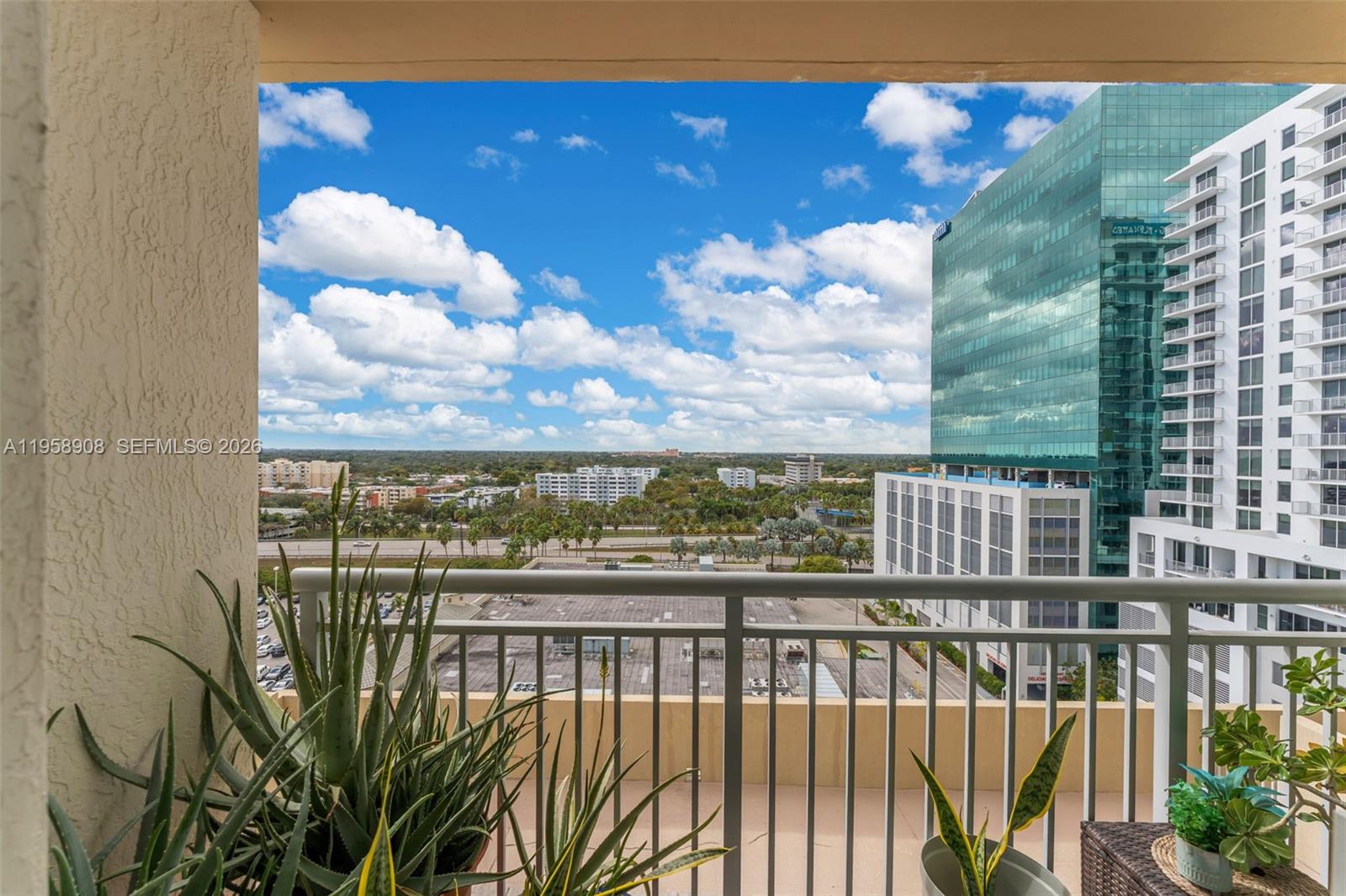 9066 Southwest 73rd Court, Unit 908 Miami, FL 33156 - Photo 23 of 46 a view of a balcony with city view