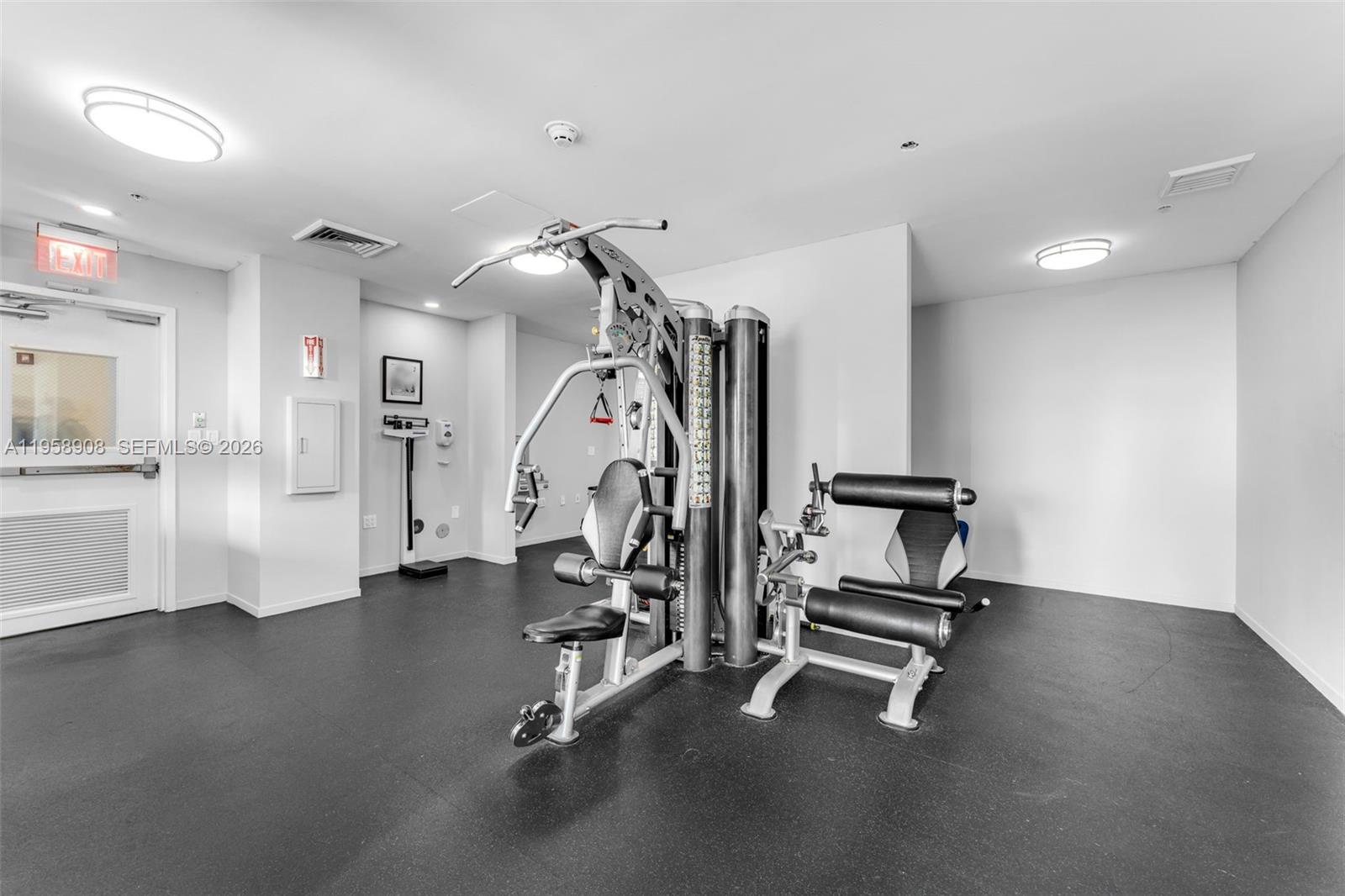9066 Southwest 73rd Court, Unit 908 Miami, FL 33156 - Photo 28 of 46 a view of a room with gym equipment