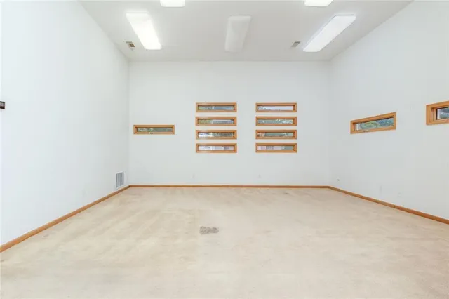 an empty room with windows