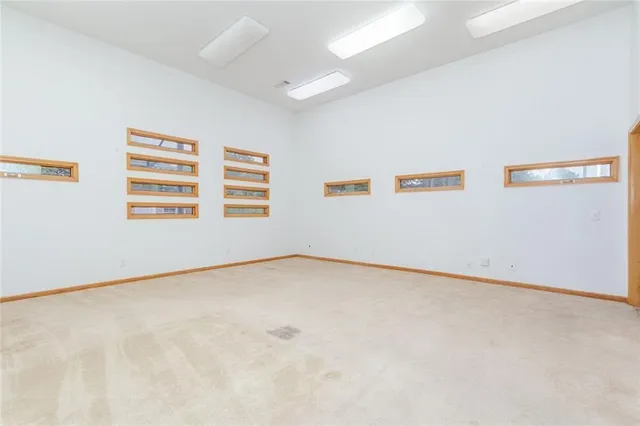 an empty room with windows