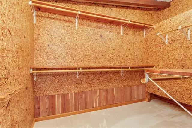 a house that has a tree in front of it