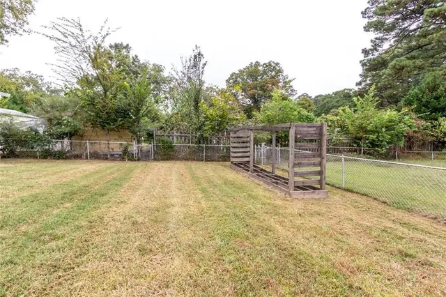 a house with trees in the background
