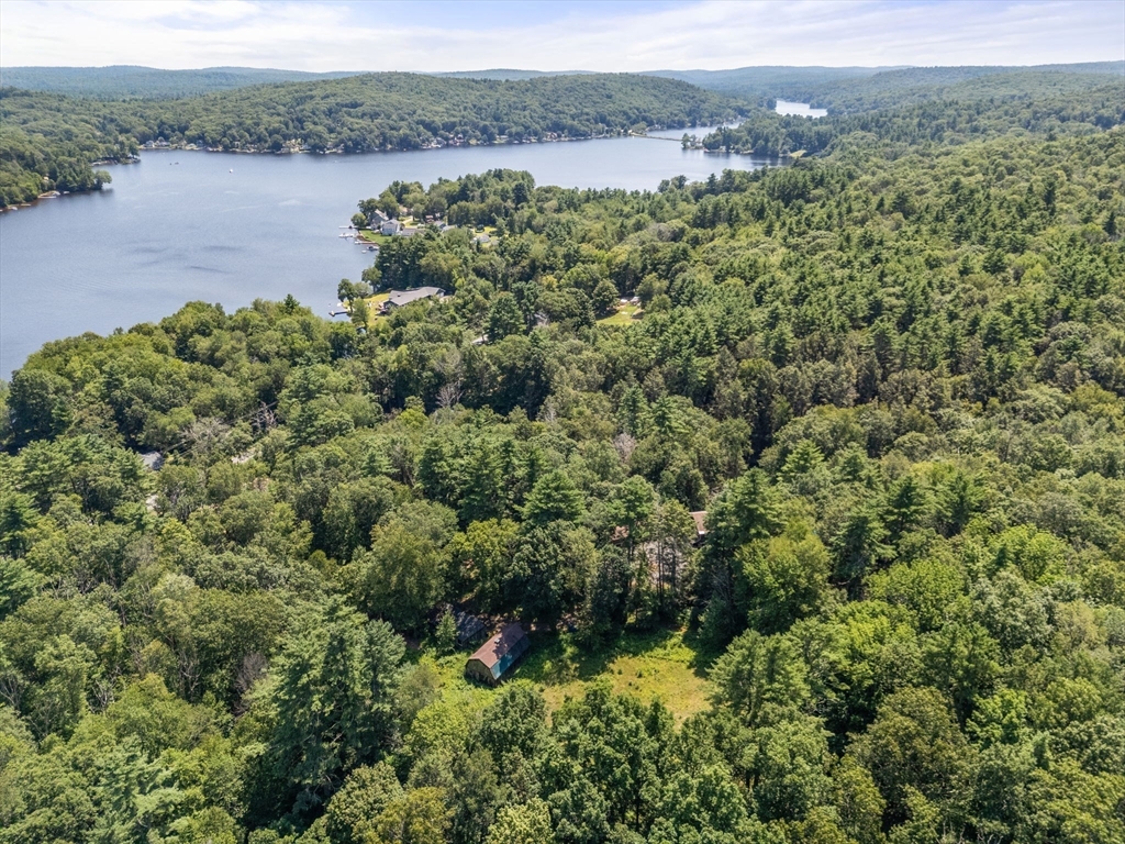 44 Mashapaug Road Holland, MA 01521 - Photo 31 of 41 an aerial view of a houses with a lake view