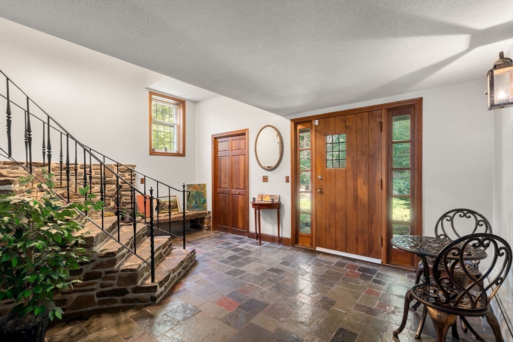 44 Mashapaug Road Holland, MA 01521 - Photo 4 of 41 a view of an entryway with a front door