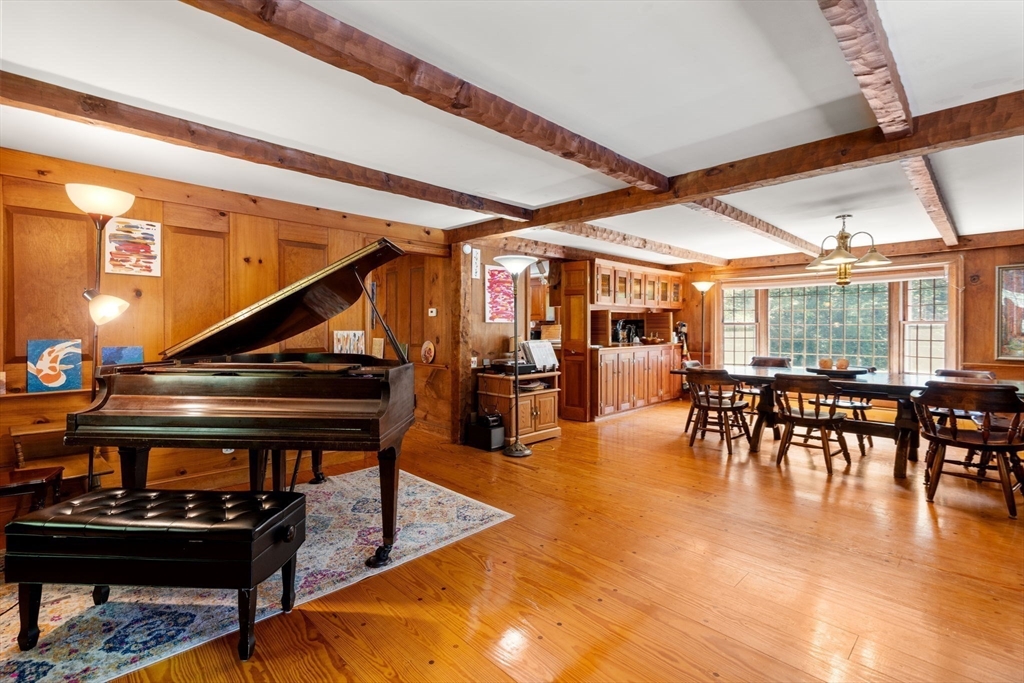44 Mashapaug Road Holland, MA 01521 - Photo 8 of 41 a room with lots of furniture and a dining table