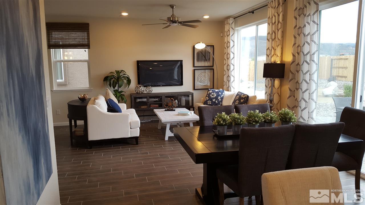 2010 Harmony Valley Way Reno, NV 89521 - Photo 5 of 7 a living room with furniture and a flat screen tv
