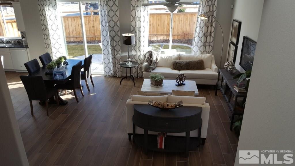 2010 Harmony Valley Way Reno, NV 89521 - Photo 7 of 7 a living room with furniture and a large window