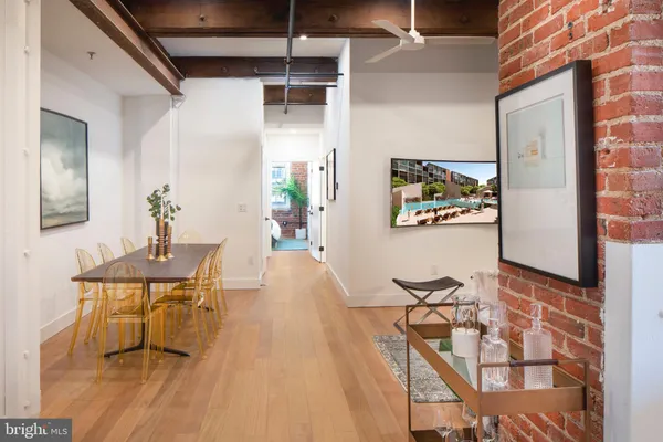 a view of a workspace with furniture