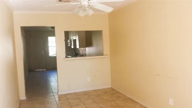 a view of a bathroom with a sink and a mirror