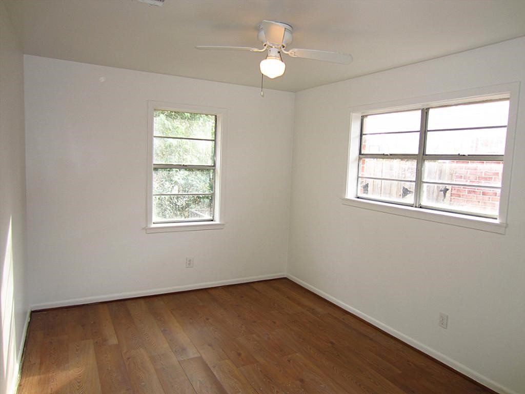 3810 Cochran Street Houston, TX 77009 - Photo 10 of 12 an empty room with a window