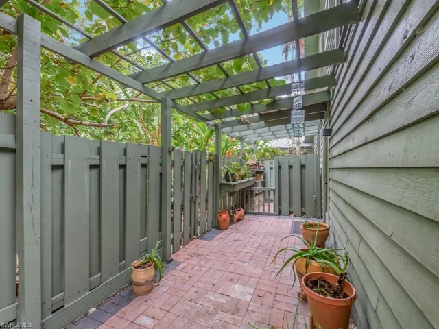 a backyard of a house with seating space