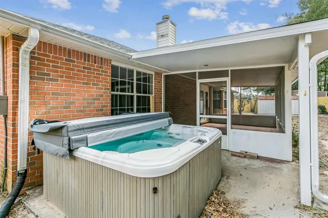 a bathroom with a sink and a window