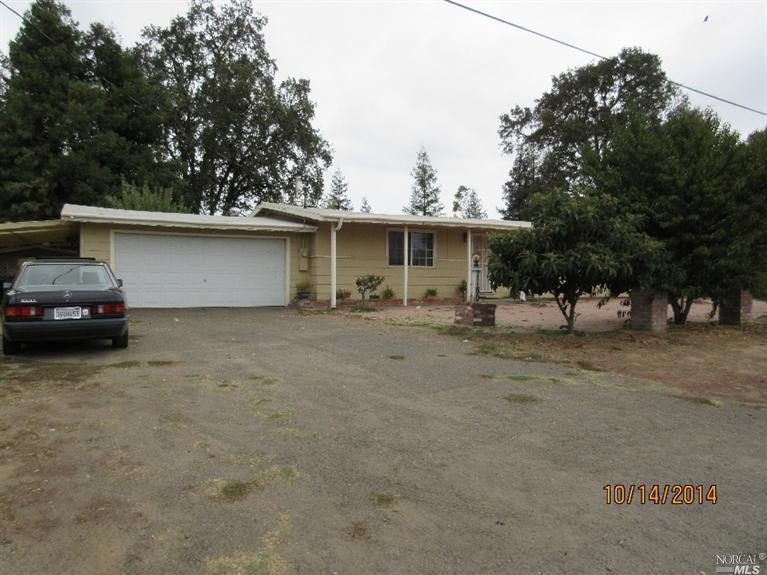 1180 Talmage Road Ukiah, CA 95482 - Photo 1 of 1 a view of a house with a patio