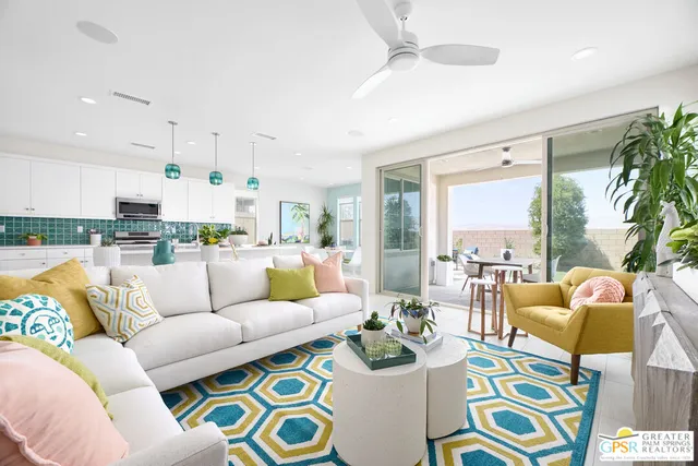 a view of an entryway with paintings on the wall