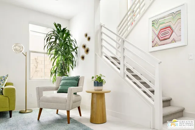 a living room with furniture and a couch