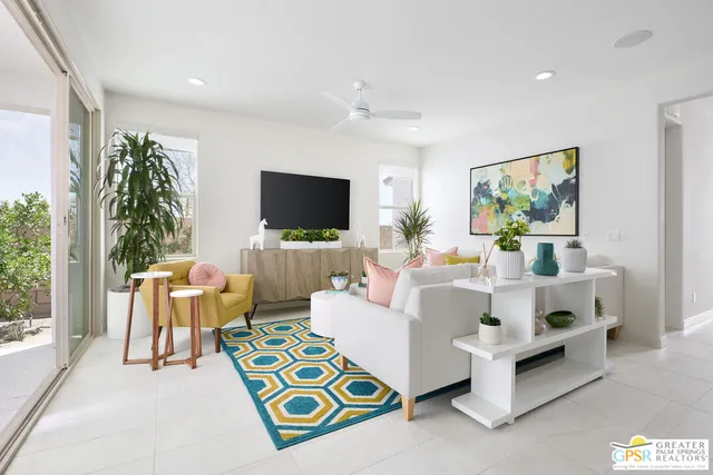 a kitchen with stainless steel appliances a refrigerator a sink and a stove