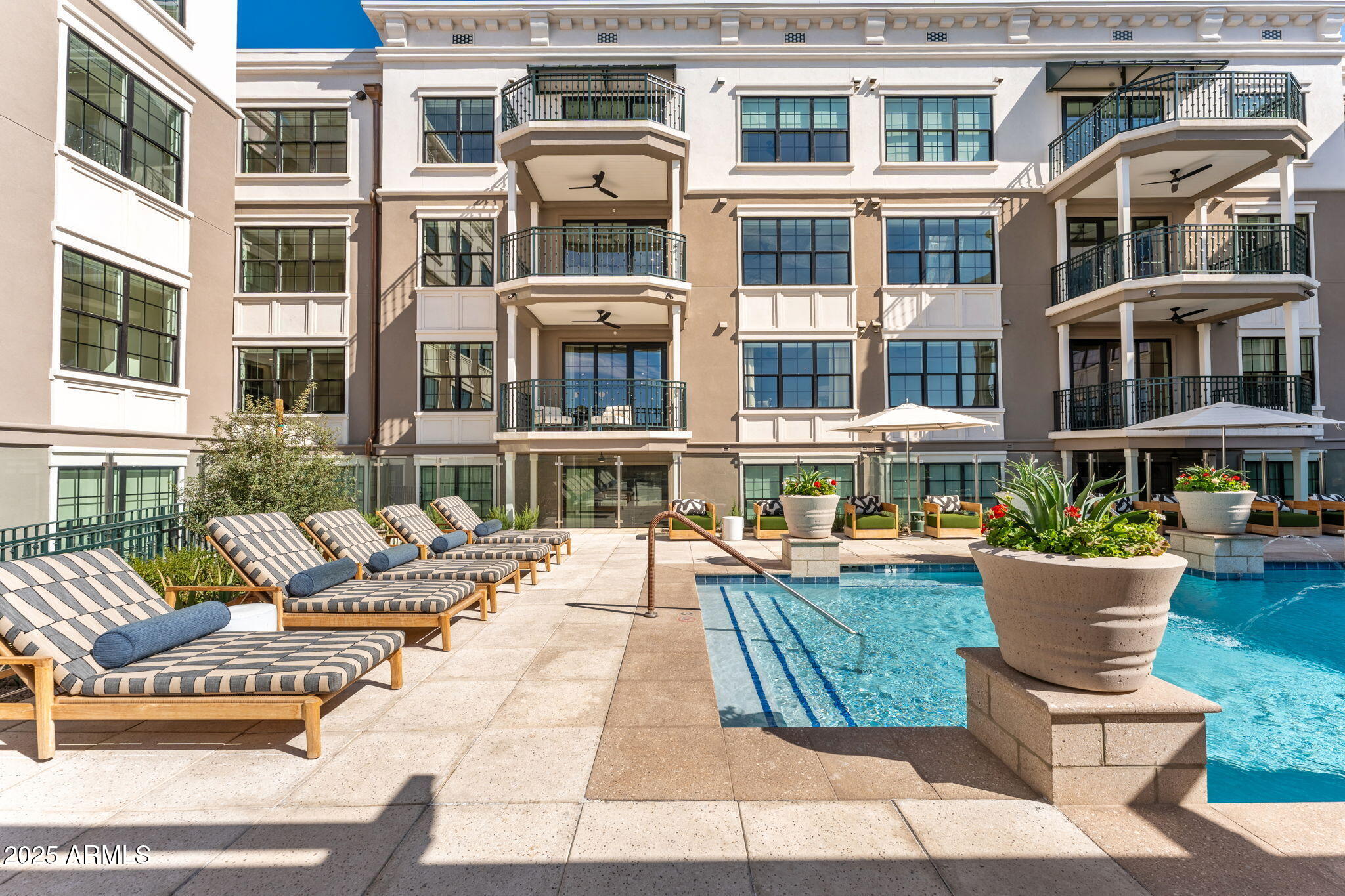 a view of a building with sitting area