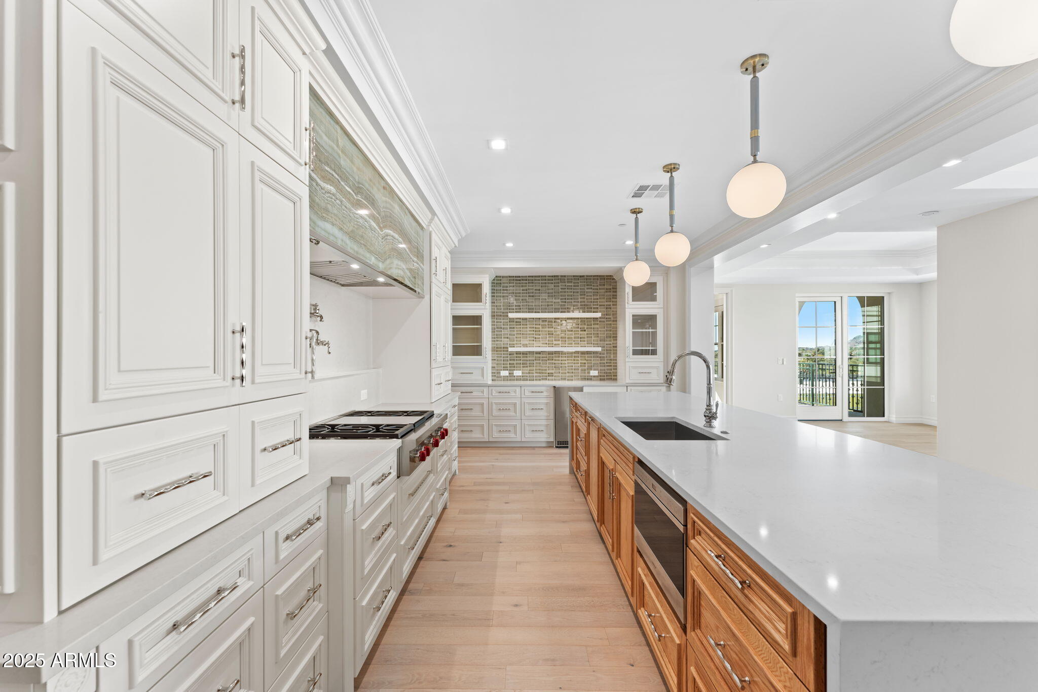 4240 East Camelback Road, Unit 401 Phoenix, AZ 85018 - Photo 4 of 10 a kitchen with stainless steel appliances granite countertop lots of counter space and windows