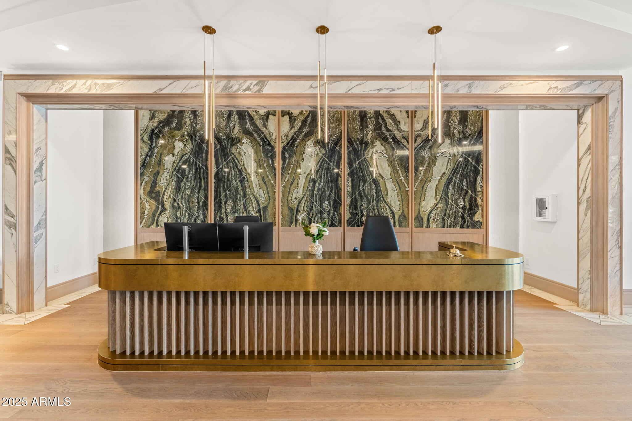 4240 East Camelback Road, Unit 401 Phoenix, AZ 85018 - Photo 8 of 10 a living room with a table and chairs